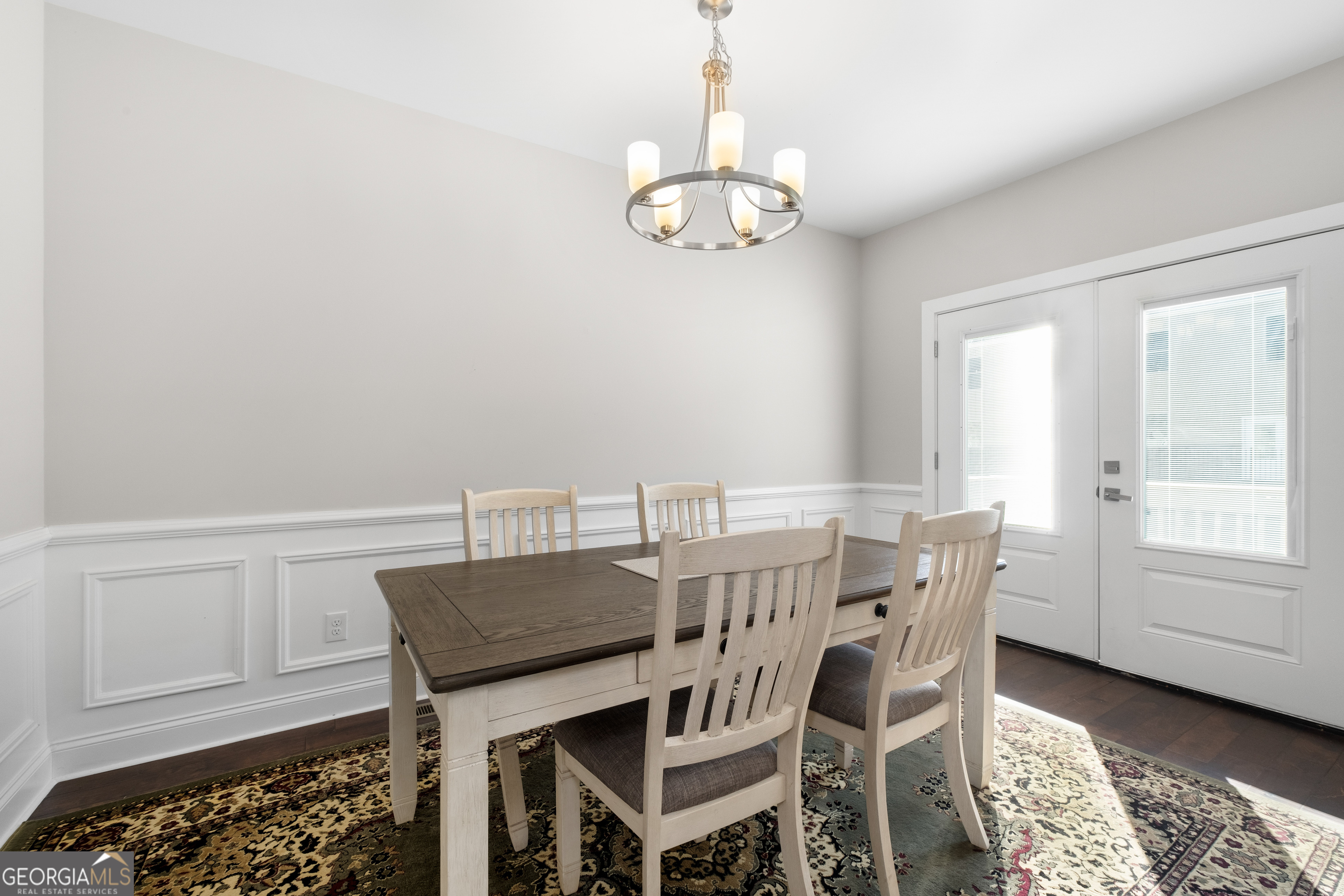 3775 Jack Vernon Circle Powder Springs, GA 30127 - Photo 9 of 33 a view of a dining room with furniture and chandelier