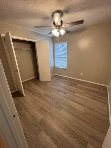 a view of backyard with green space