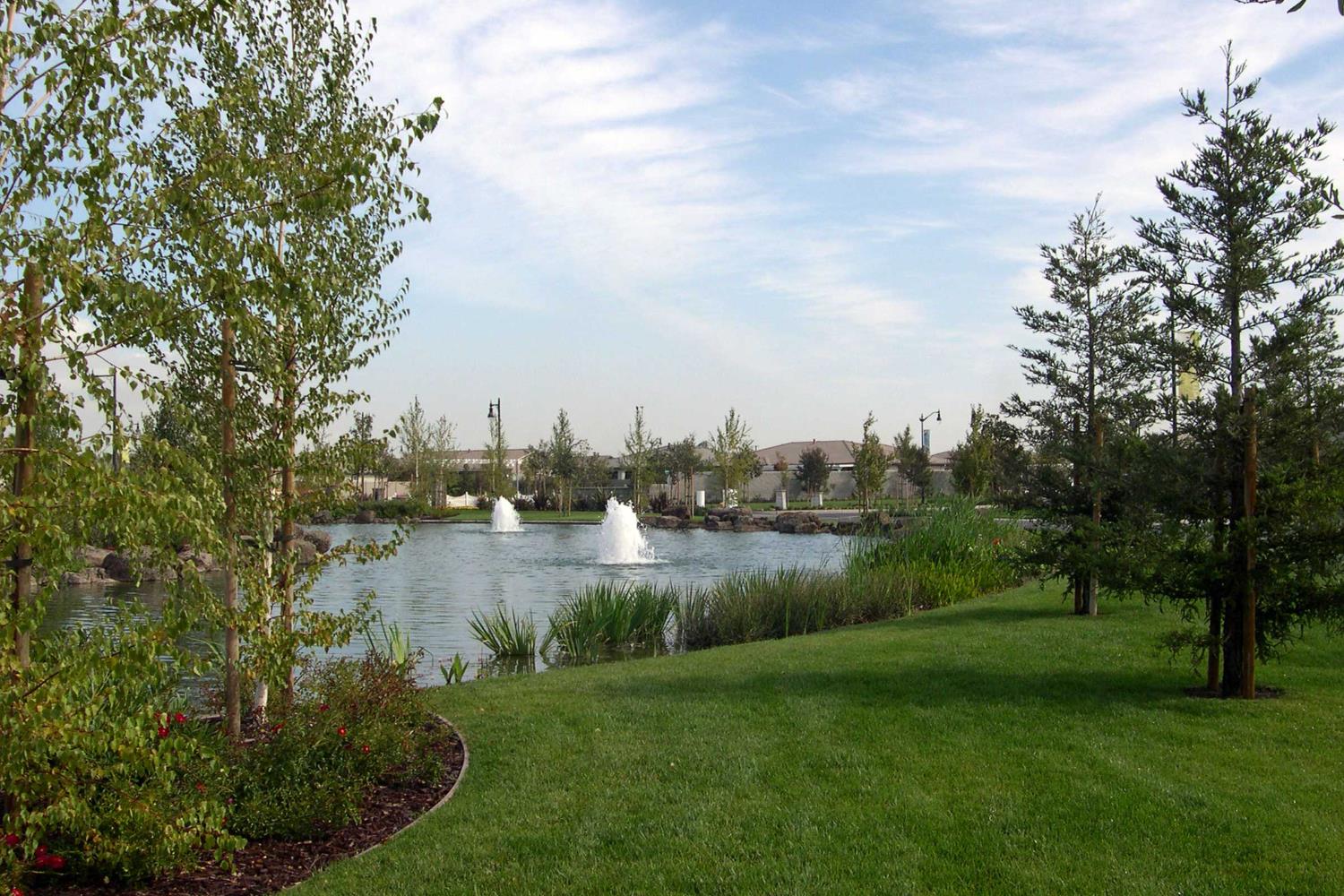 1709 Fox Trot Way Manteca, CA 95336 - Photo 22 of 24 a view of a lake with a city