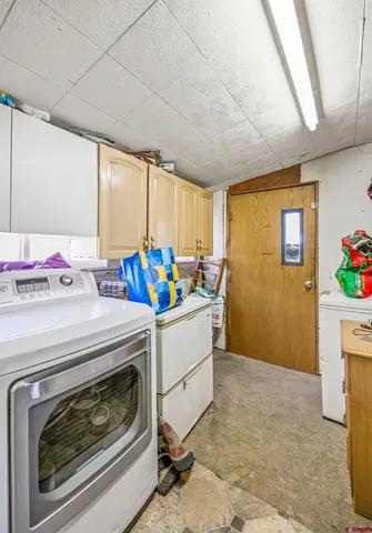 a bathroom with a sink a toilet and vanity