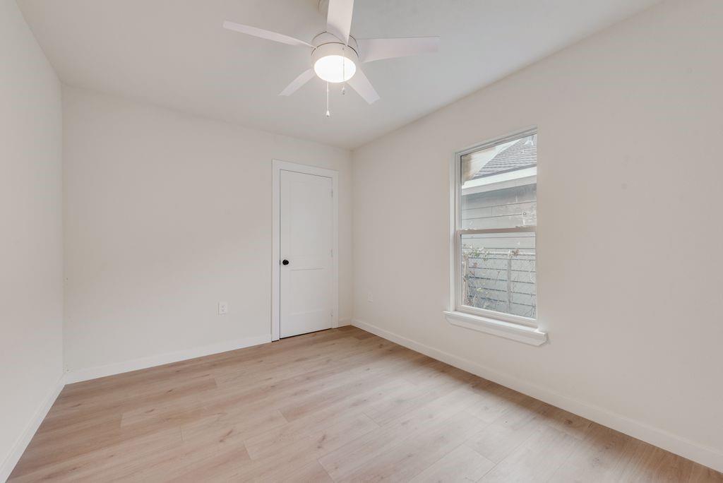 3414 Vilbig Road Dallas, TX 75212 - Photo 14 of 27 an empty room with windows and closet