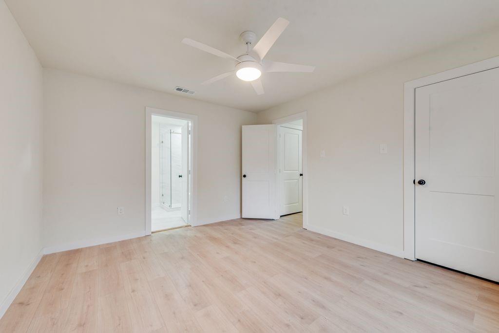 3414 Vilbig Road Dallas, TX 75212 - Photo 20 of 27 a view of an empty room with wooden floor