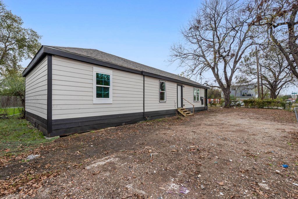 3414 Vilbig Road Dallas, TX 75212 - Photo 25 of 27 a view of a house with a backyard