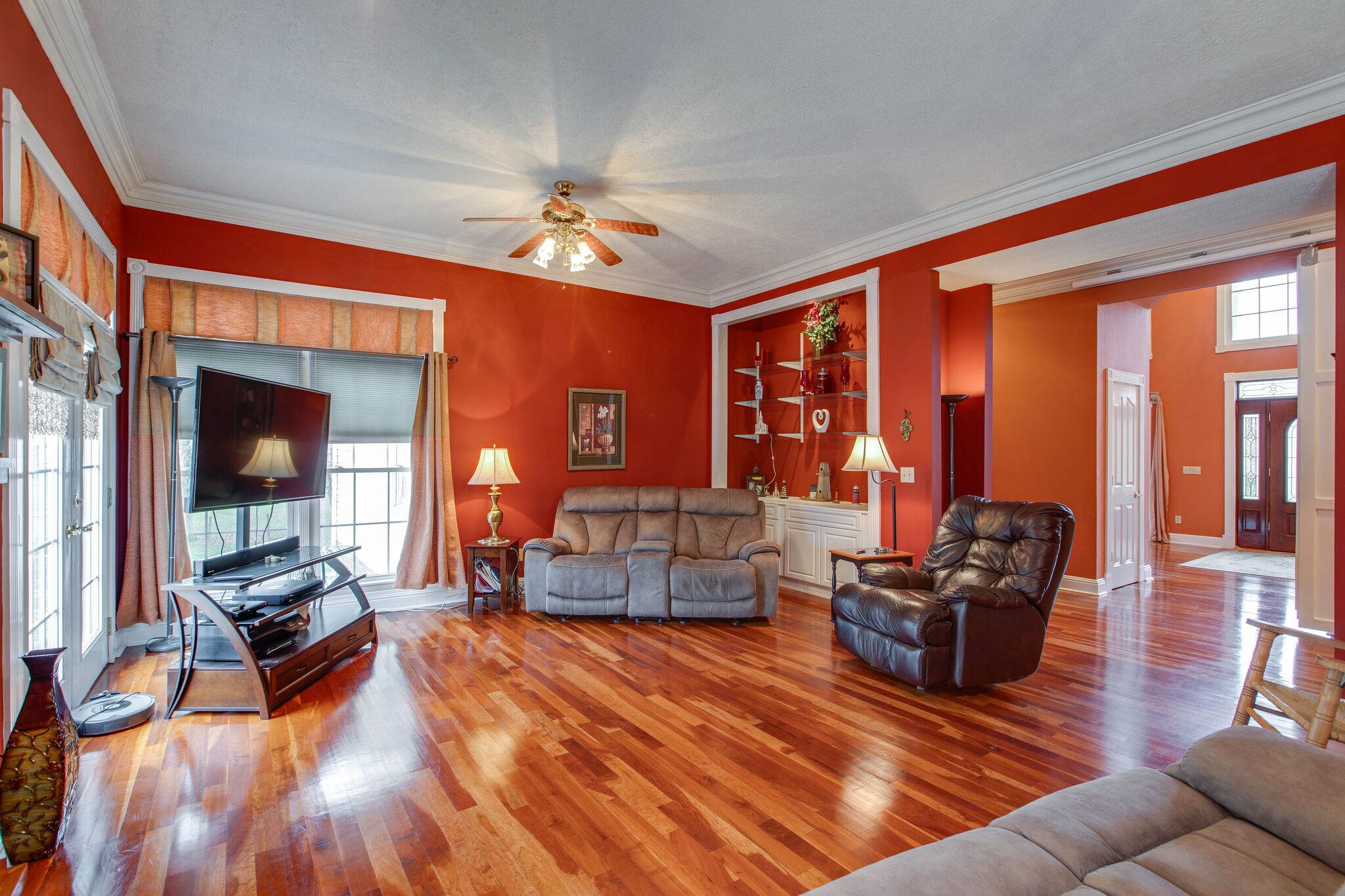 7217 Kingston Road Fairview, TN 37062 - Photo 11 of 50 a living room with furniture fireplace and a large window