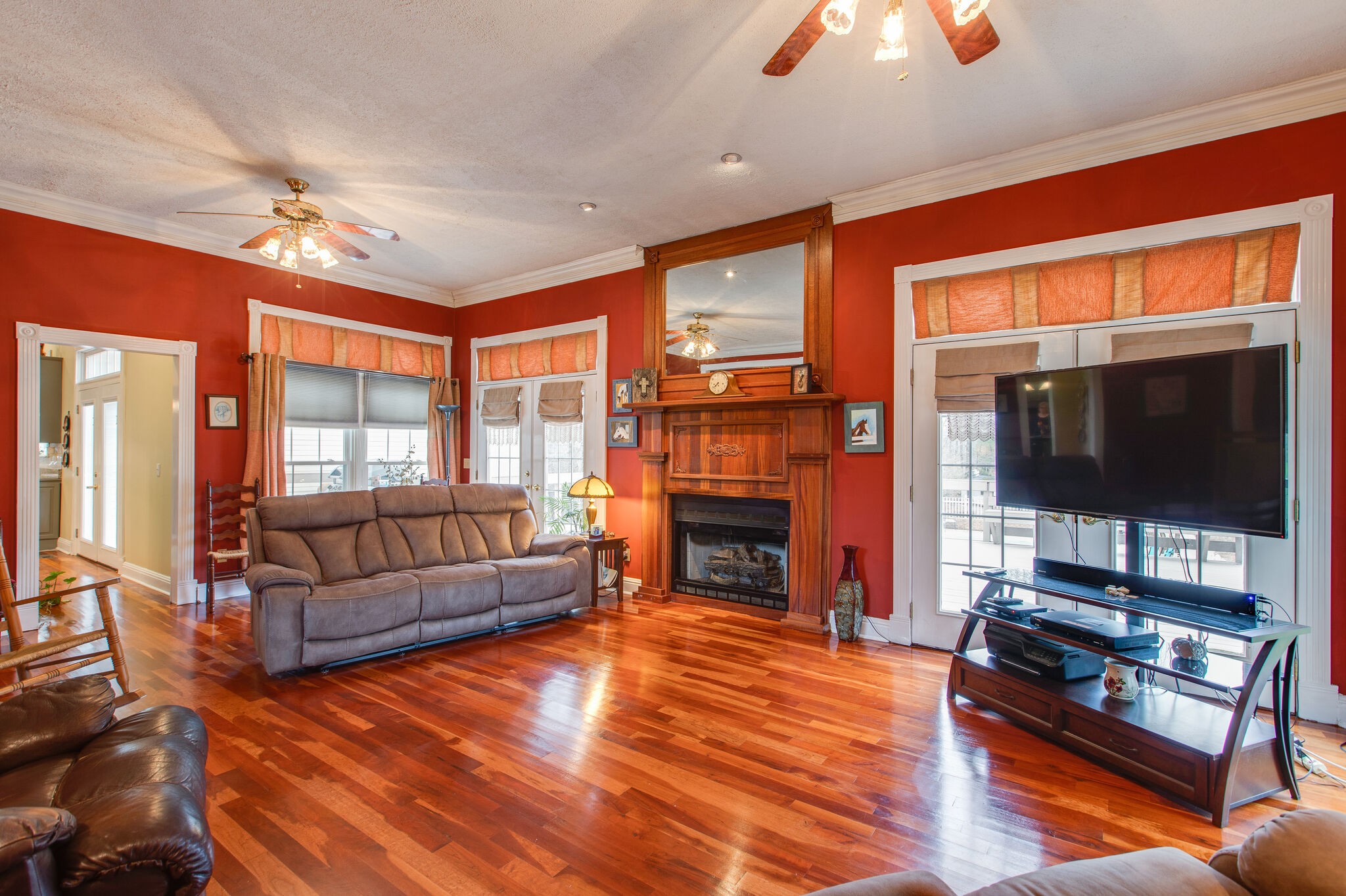 7217 Kingston Road Fairview, TN 37062 - Photo 12 of 50 a living room with furniture flat screen tv and a fireplace