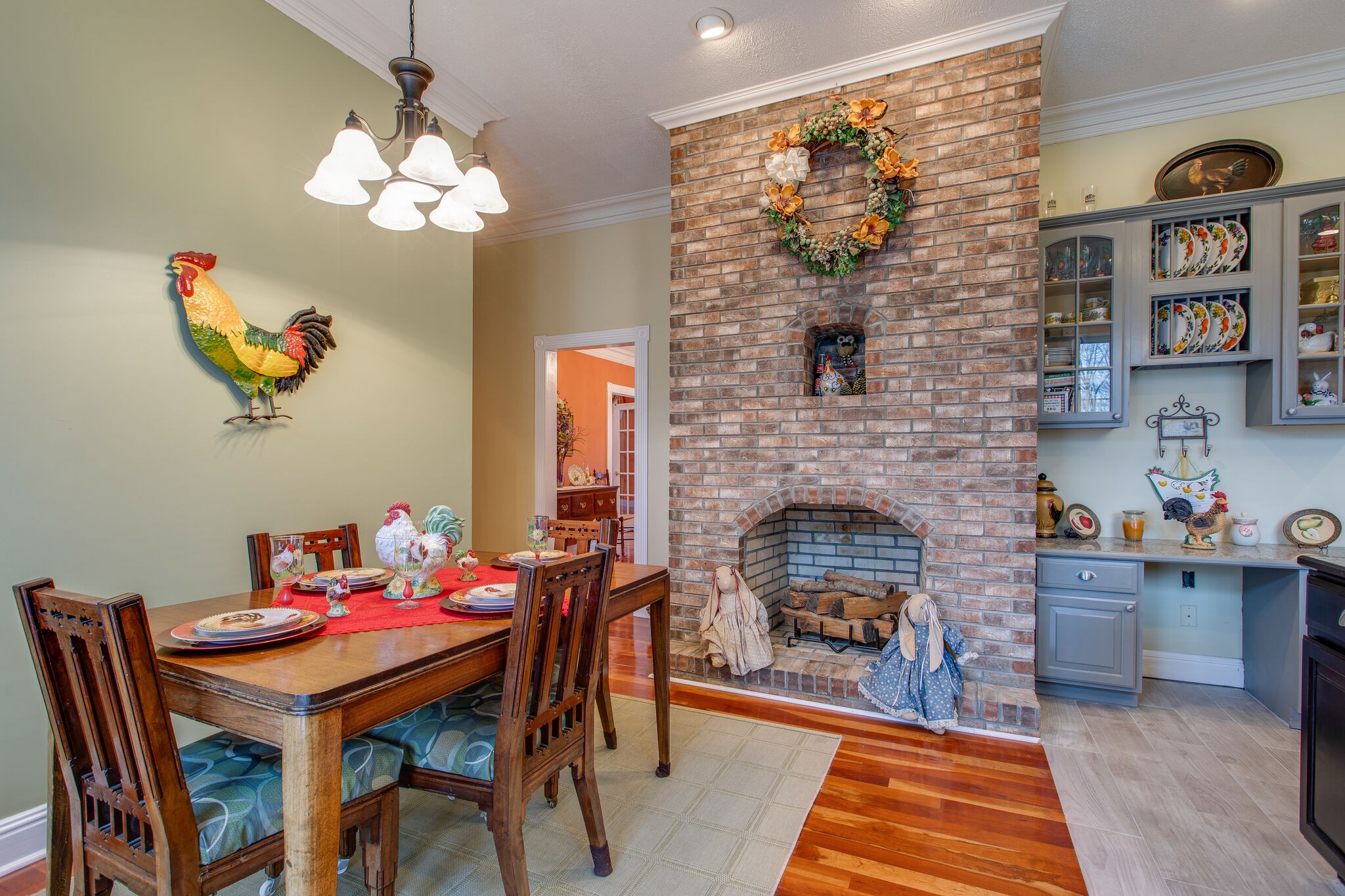 7217 Kingston Road Fairview, TN 37062 - Photo 17 of 50 a living room with a dining table and a fireplace