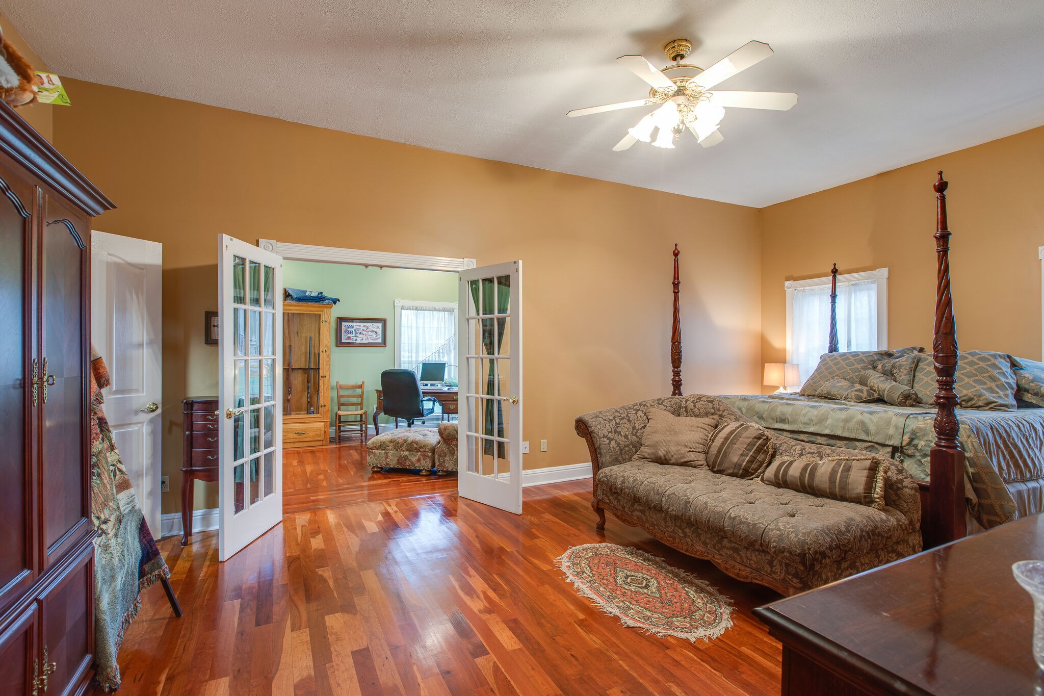 7217 Kingston Road Fairview, TN 37062 - Photo 25 of 50 a living room with furniture and a chandelier