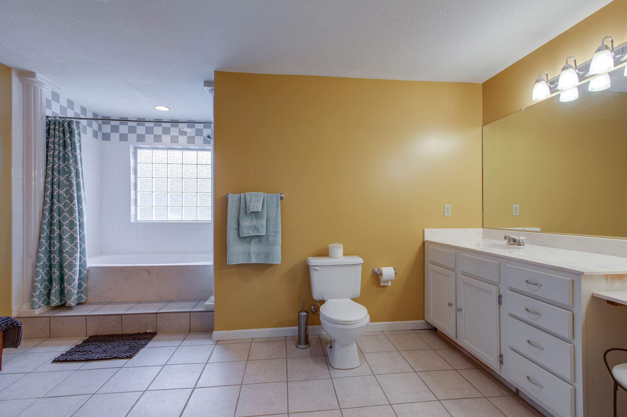 7217 Kingston Road Fairview, TN 37062 - Photo 33 of 50 a bathroom with a sink mirror vanity and toilet