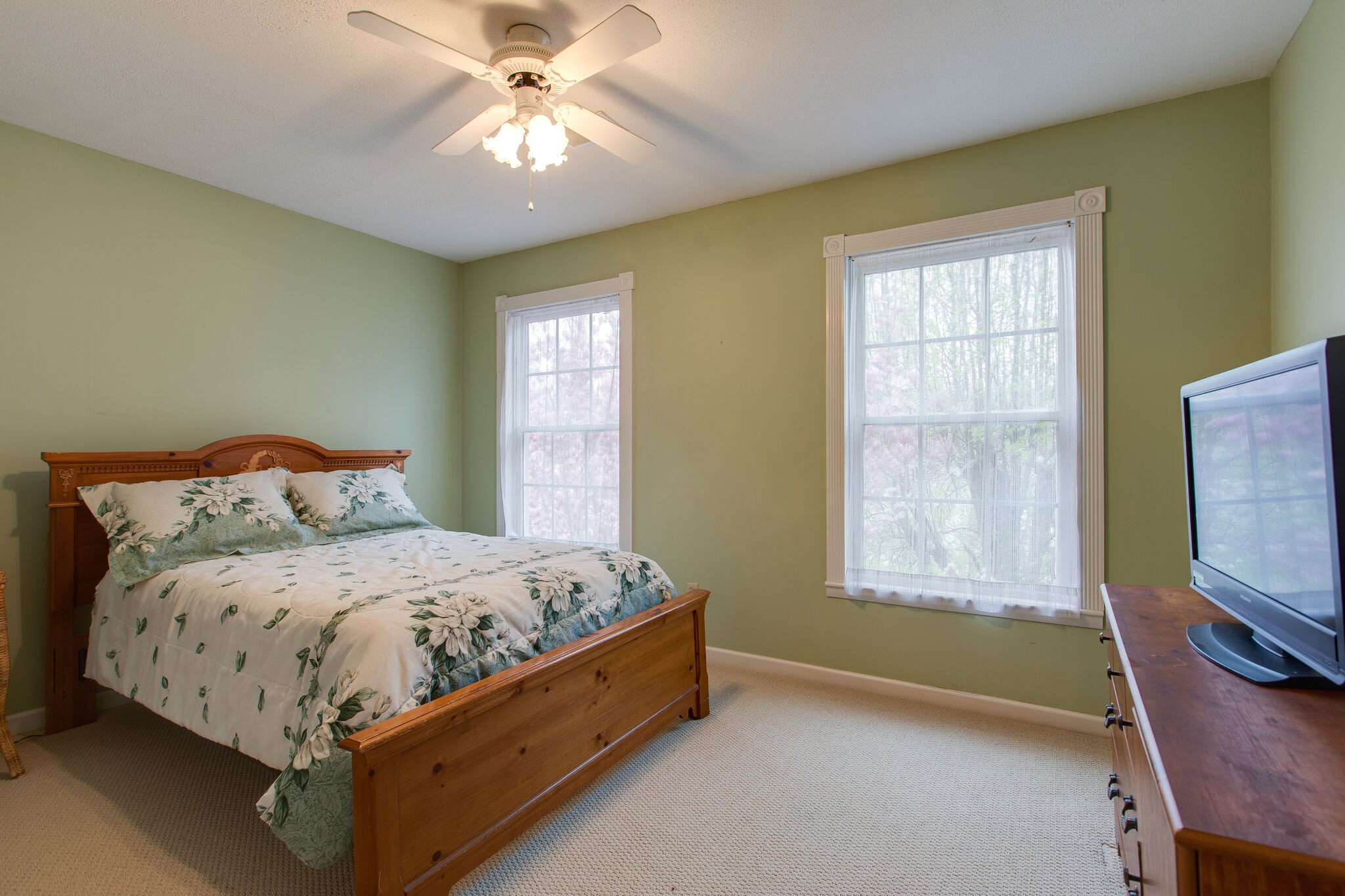 7217 Kingston Road Fairview, TN 37062 - Photo 35 of 50 a bedroom with a bed and a tv