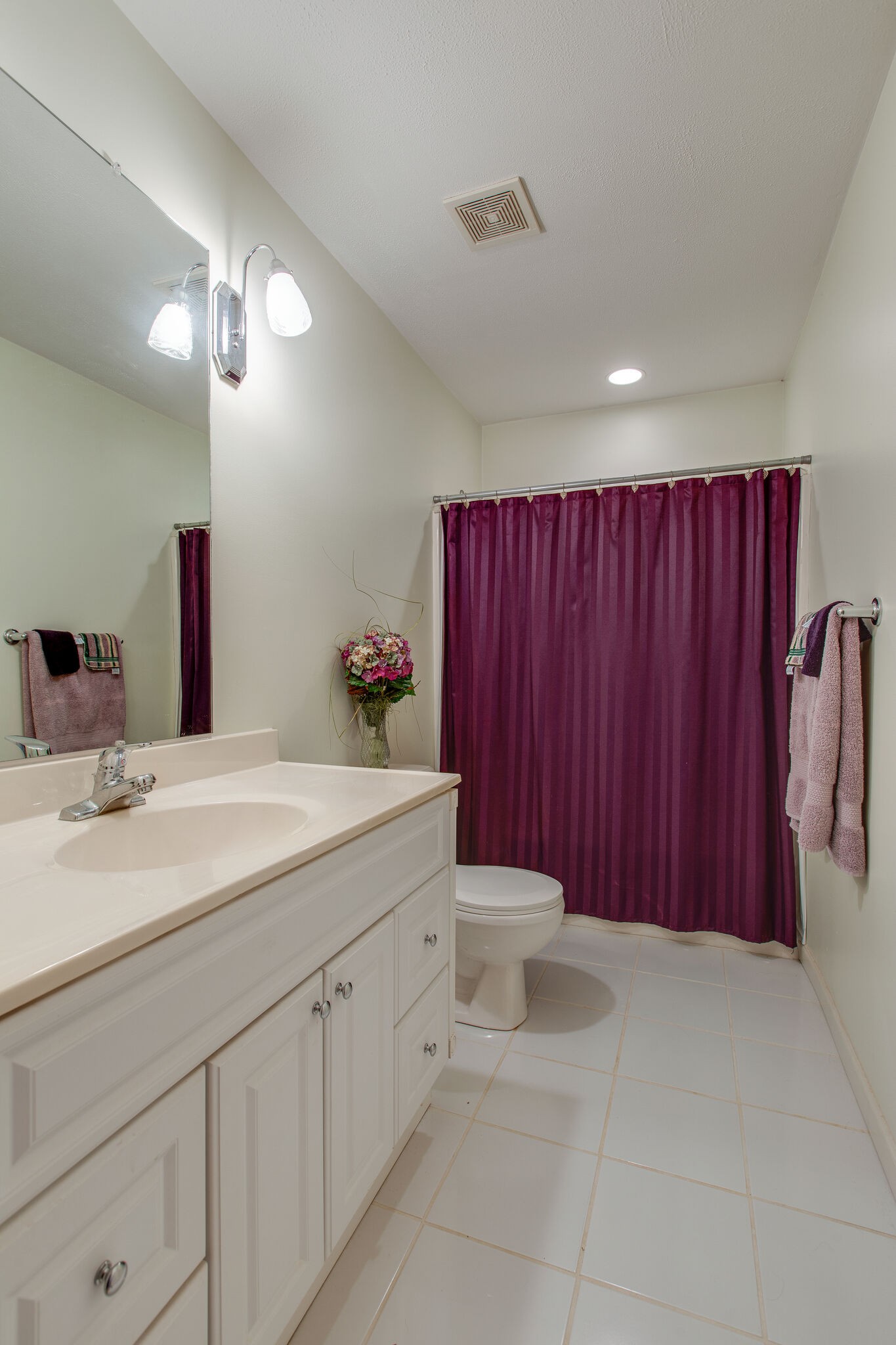 7217 Kingston Road Fairview, TN 37062 - Photo 36 of 50 a spacious bathroom with a sink and a mirror