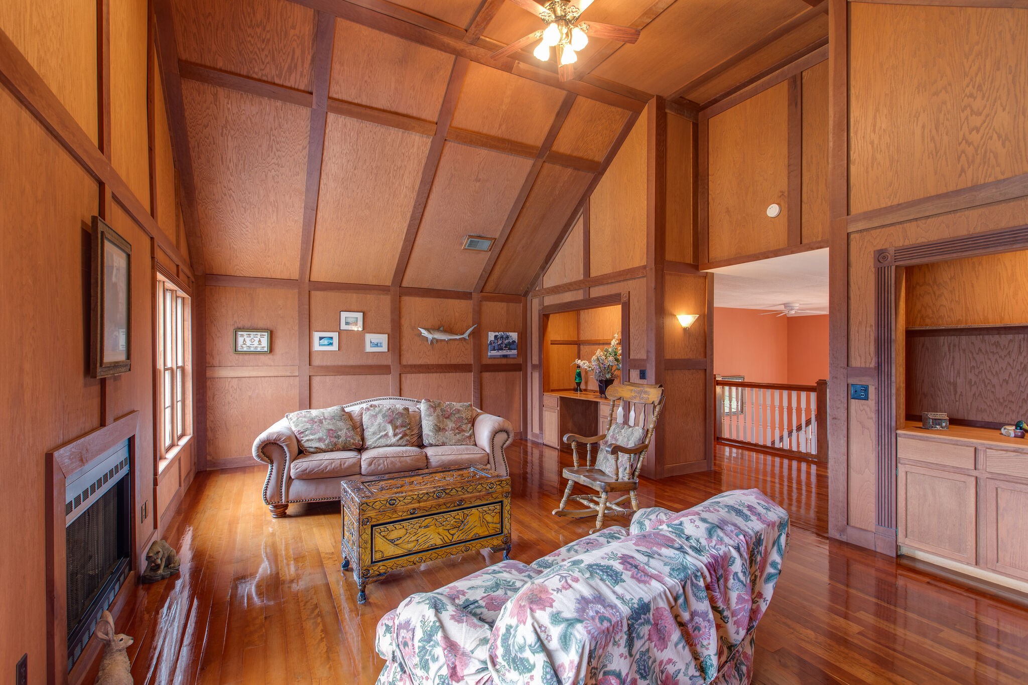 7217 Kingston Road Fairview, TN 37062 - Photo 39 of 50 a living room with furniture a fireplace and wooden floor