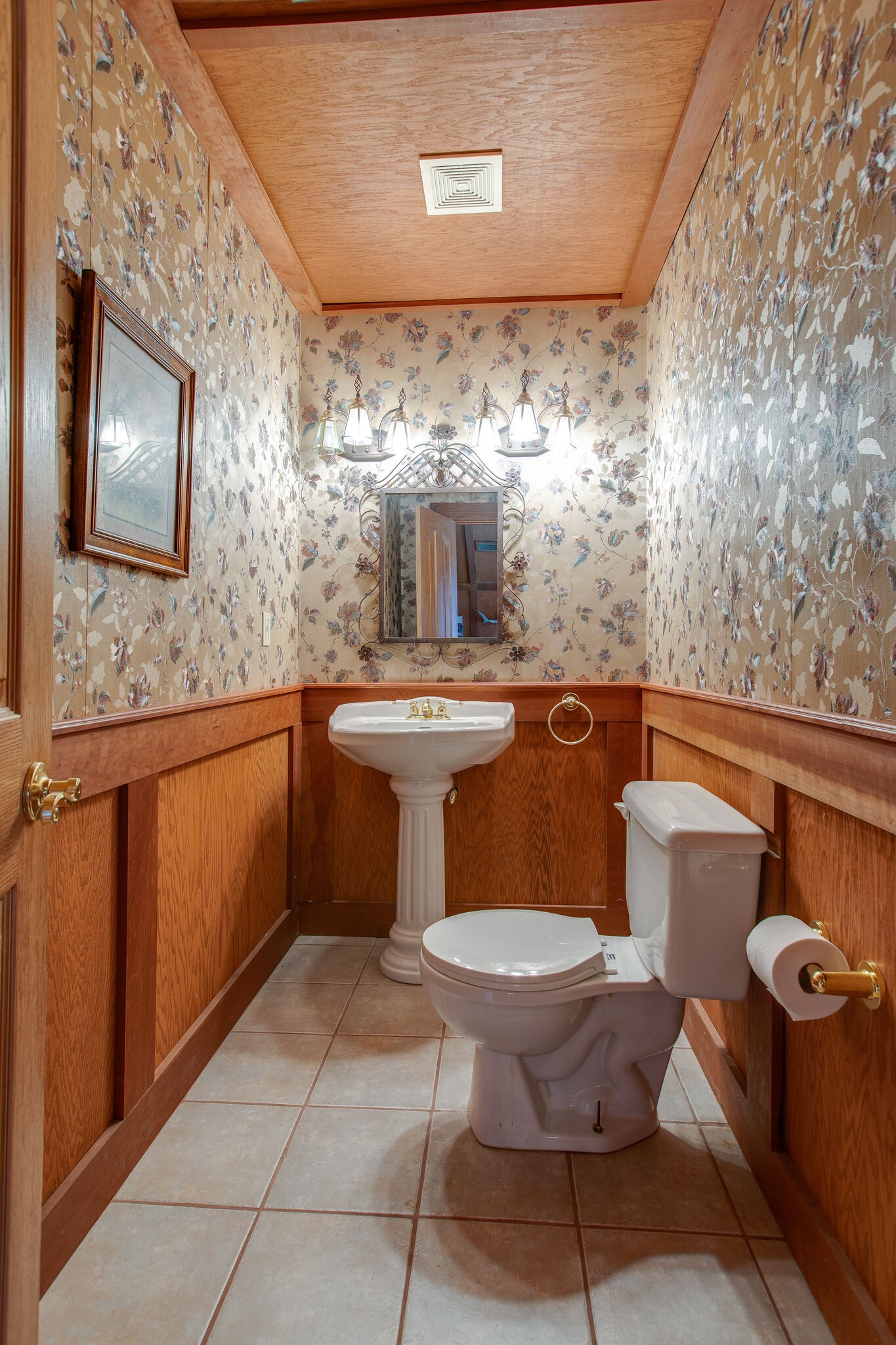 7217 Kingston Road Fairview, TN 37062 - Photo 41 of 50 a bathroom with a toilet a sink and mirror