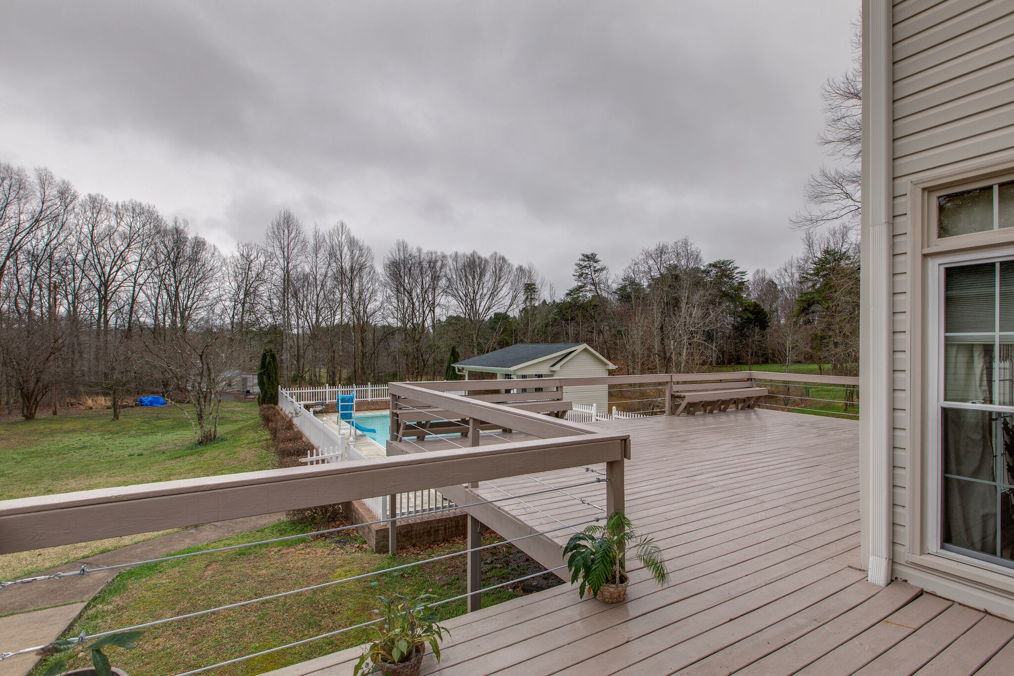 7217 Kingston Road Fairview, TN 37062 - Photo 42 of 50 a view of a terrace with chairs and wooden floor