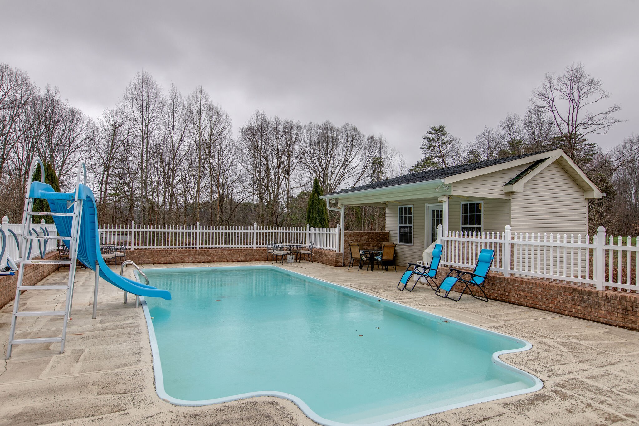 7217 Kingston Road Fairview, TN 37062 - Photo 43 of 50 a view of a house with swimming pool and sitting area