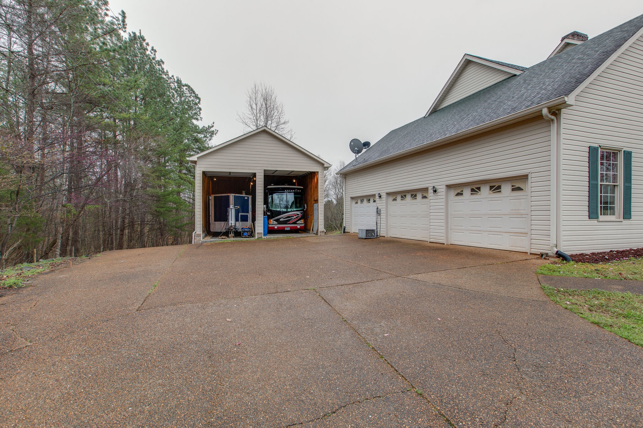 7217 Kingston Road Fairview, TN 37062 - Photo 45 of 50 a view of a house with a yard and garage
