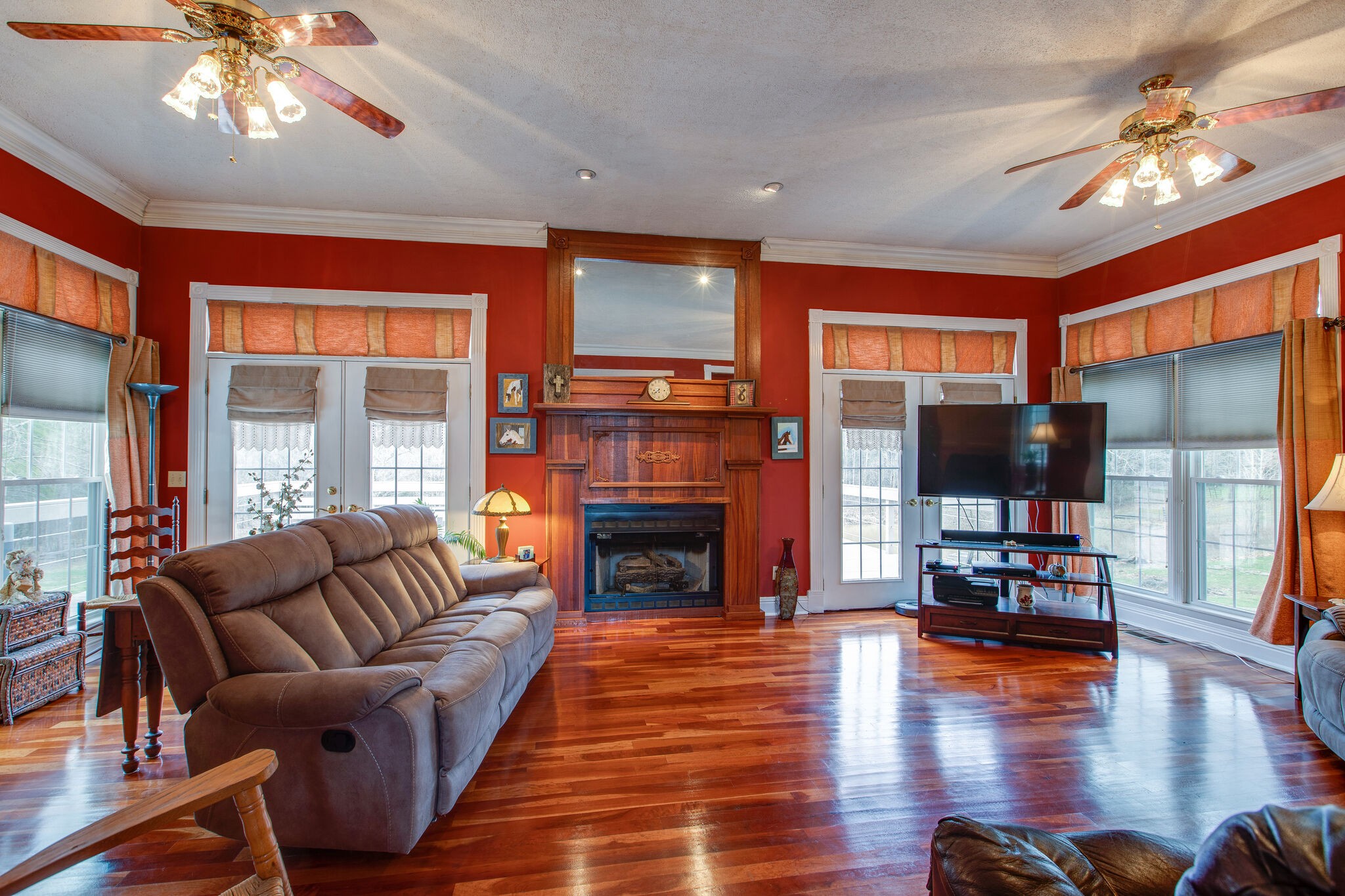 7217 Kingston Road Fairview, TN 37062 - Photo 9 of 50 a living room with furniture fireplace and flat screen tv