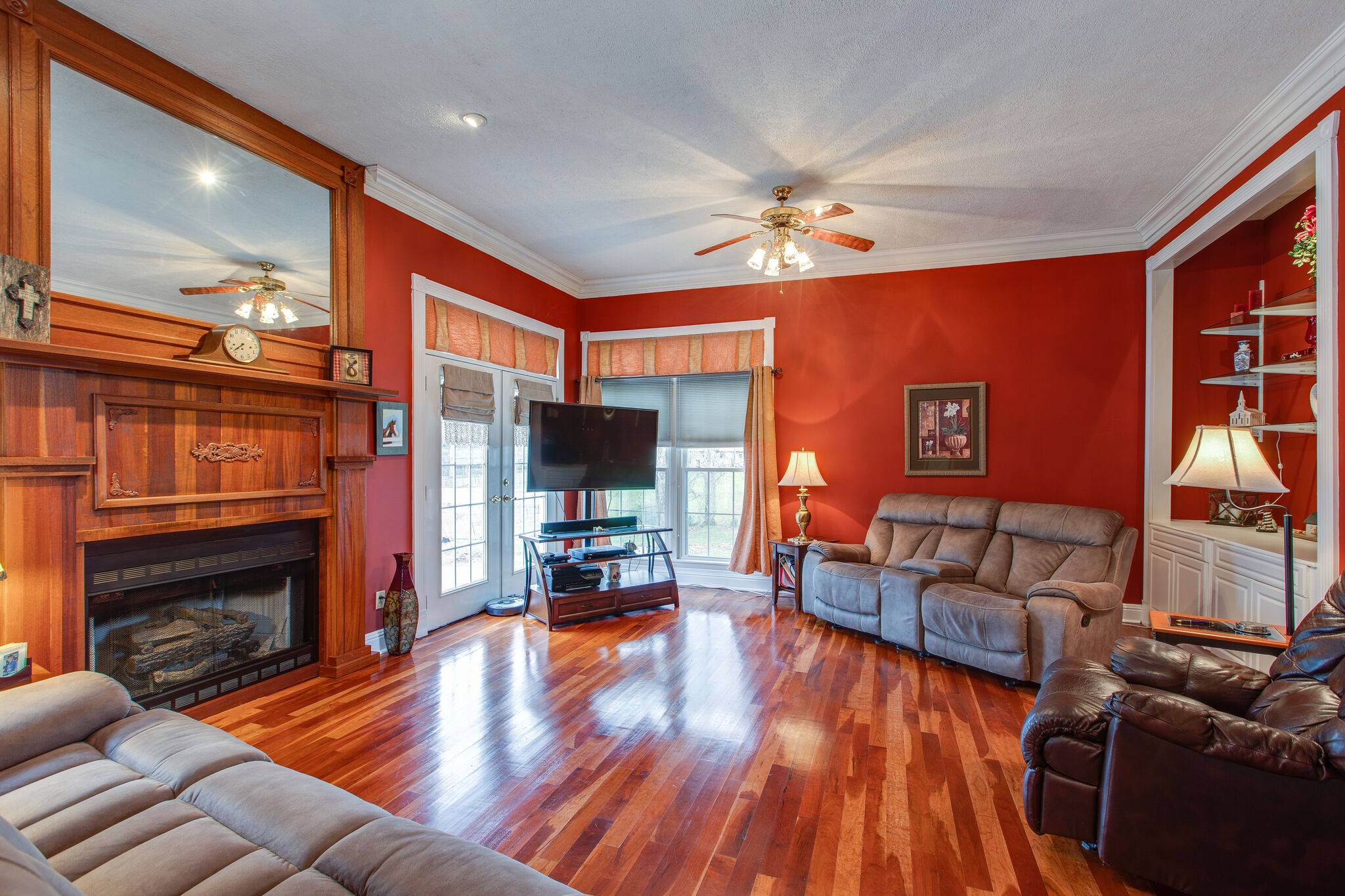 7217 Kingston Road Fairview, TN 37062 - Photo 10 of 50 a living room with fireplace furniture and a flat screen tv