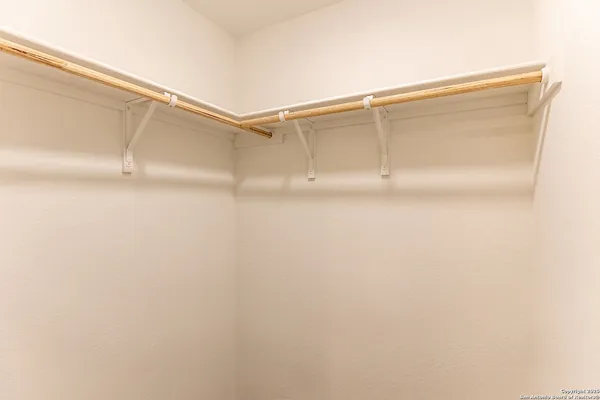a view of a bathroom from a hallway
