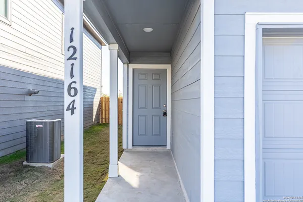 a view of a back yard from a door