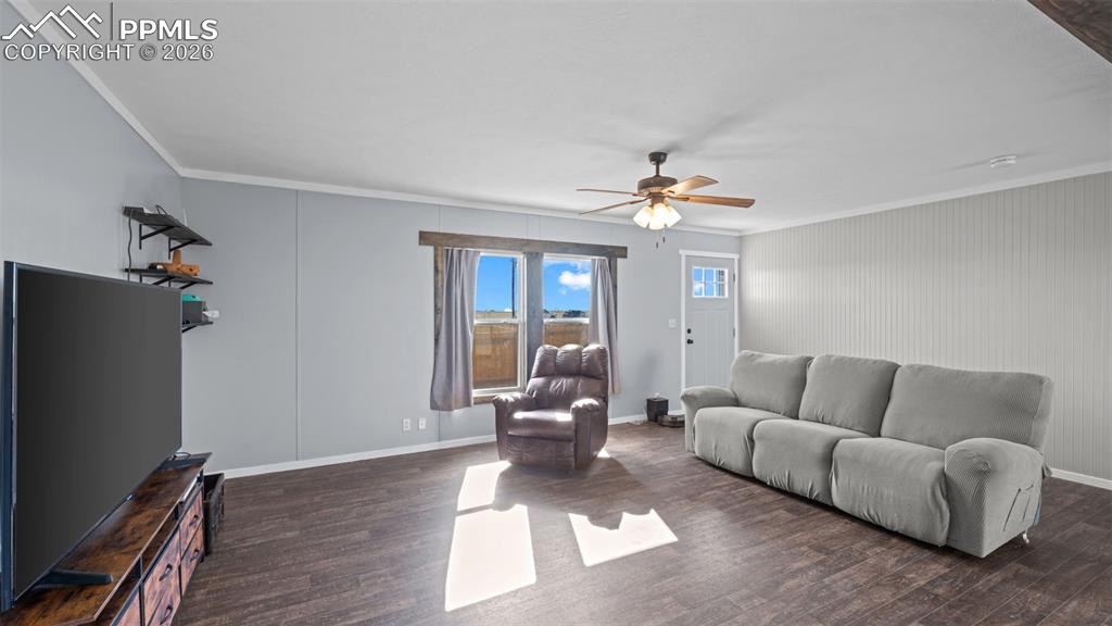 810 Awesome View Yoder, CO 80864 - Photo 14 of 43 a living room with furniture and wooden floor
