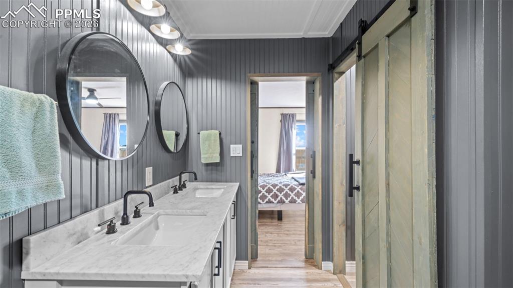810 Awesome View Yoder, CO 80864 - Photo 19 of 43 a bathroom with a sink mirror and vanity