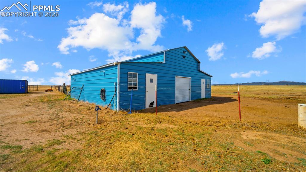 810 Awesome View Yoder, CO 80864 - Photo 27 of 43 a view of a house with a yard
