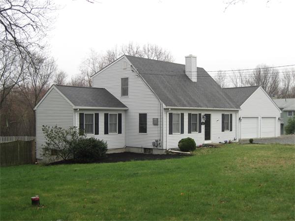 357 West Wrentham Road Cumberland, RI 02864 - Photo 1 of 18 a view of a house with backyard and garden