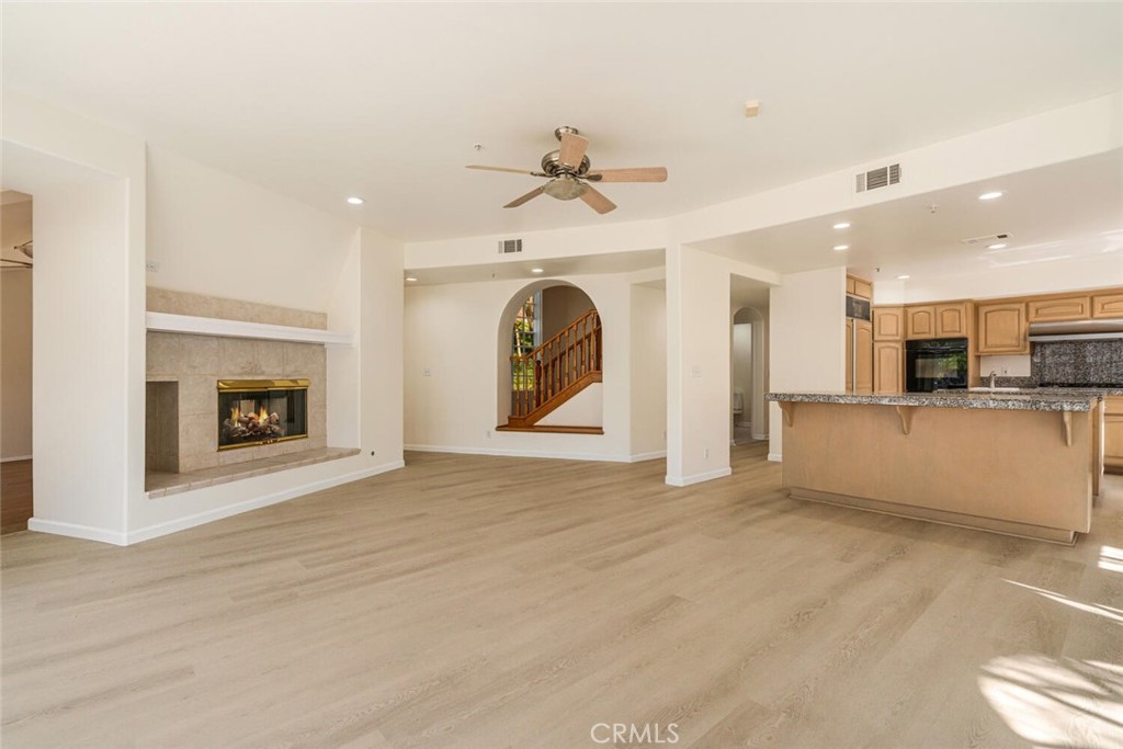 78 North Coolwater Road Bell Canyon, CA 91307 - Photo 15 of 46 a view of an empty room with a fireplace and a window