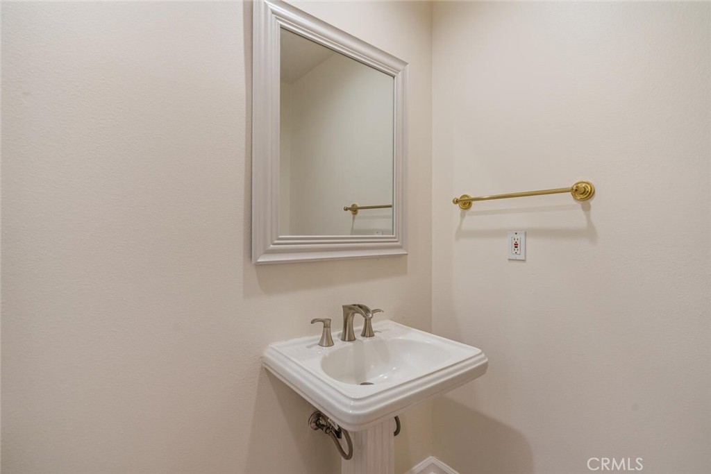 78 North Coolwater Road Bell Canyon, CA 91307 - Photo 22 of 46 a bathroom with a sink and a mirror