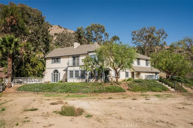 front view of a house with a street