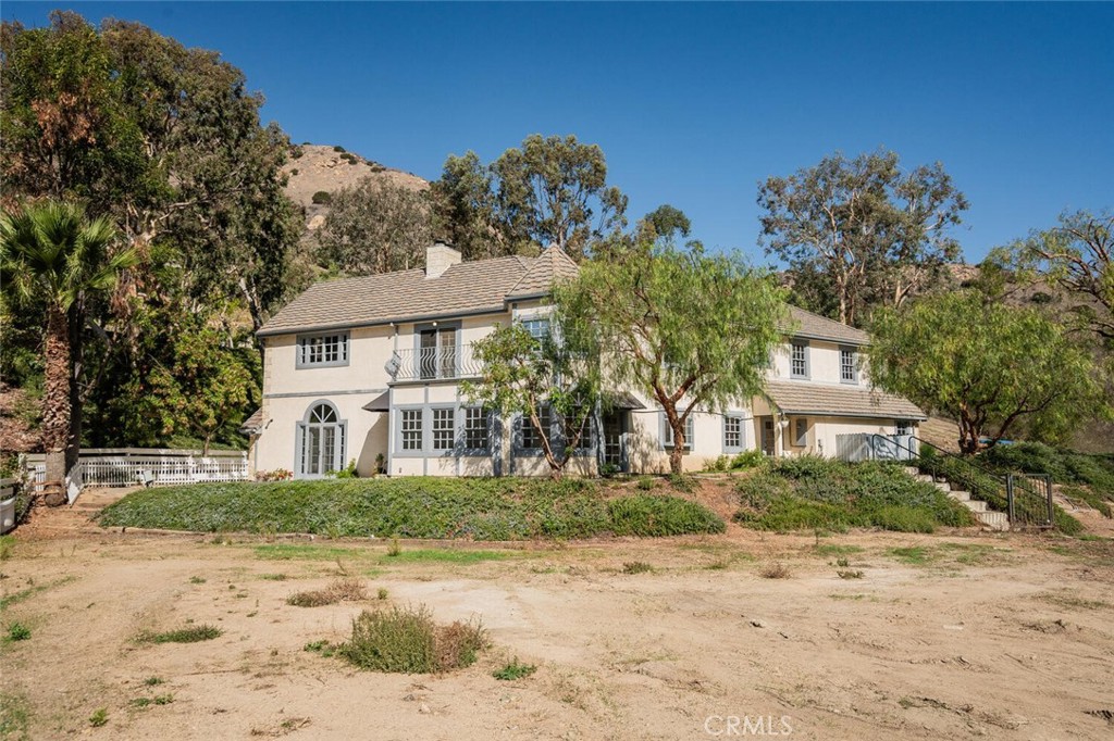 78 North Coolwater Road Bell Canyon, CA 91307 - Photo 45 of 46 front view of a house with a street