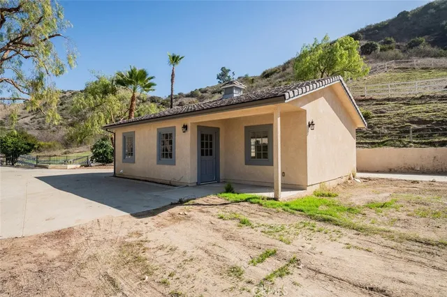 a view of a house with a patio