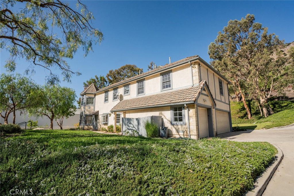 78 North Coolwater Road Bell Canyon, CA 91307 - Photo 5 of 46 a view of a house with a yard