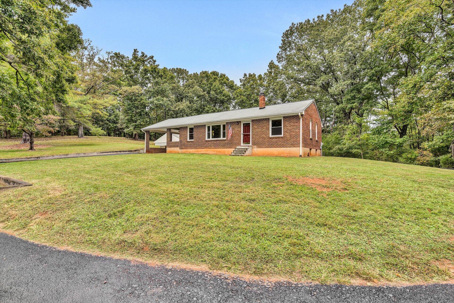 3526 Rutrough Road Southeast Roanoke, VA 24014 - Photo 1 of 33 a view of a house with a big yard
