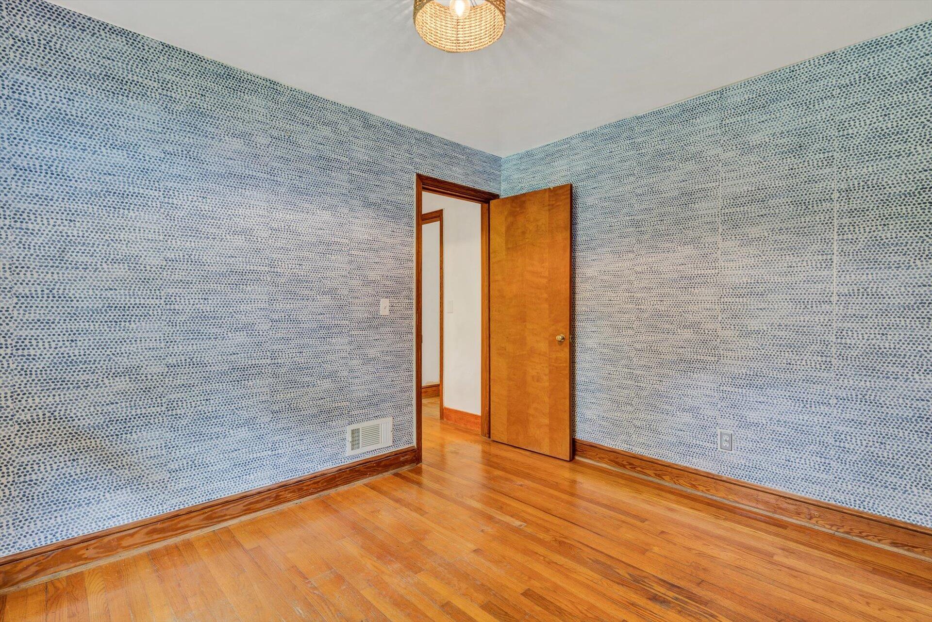 3526 Rutrough Road Southeast Roanoke, VA 24014 - Photo 18 of 33 a view of an empty room with wooden floor