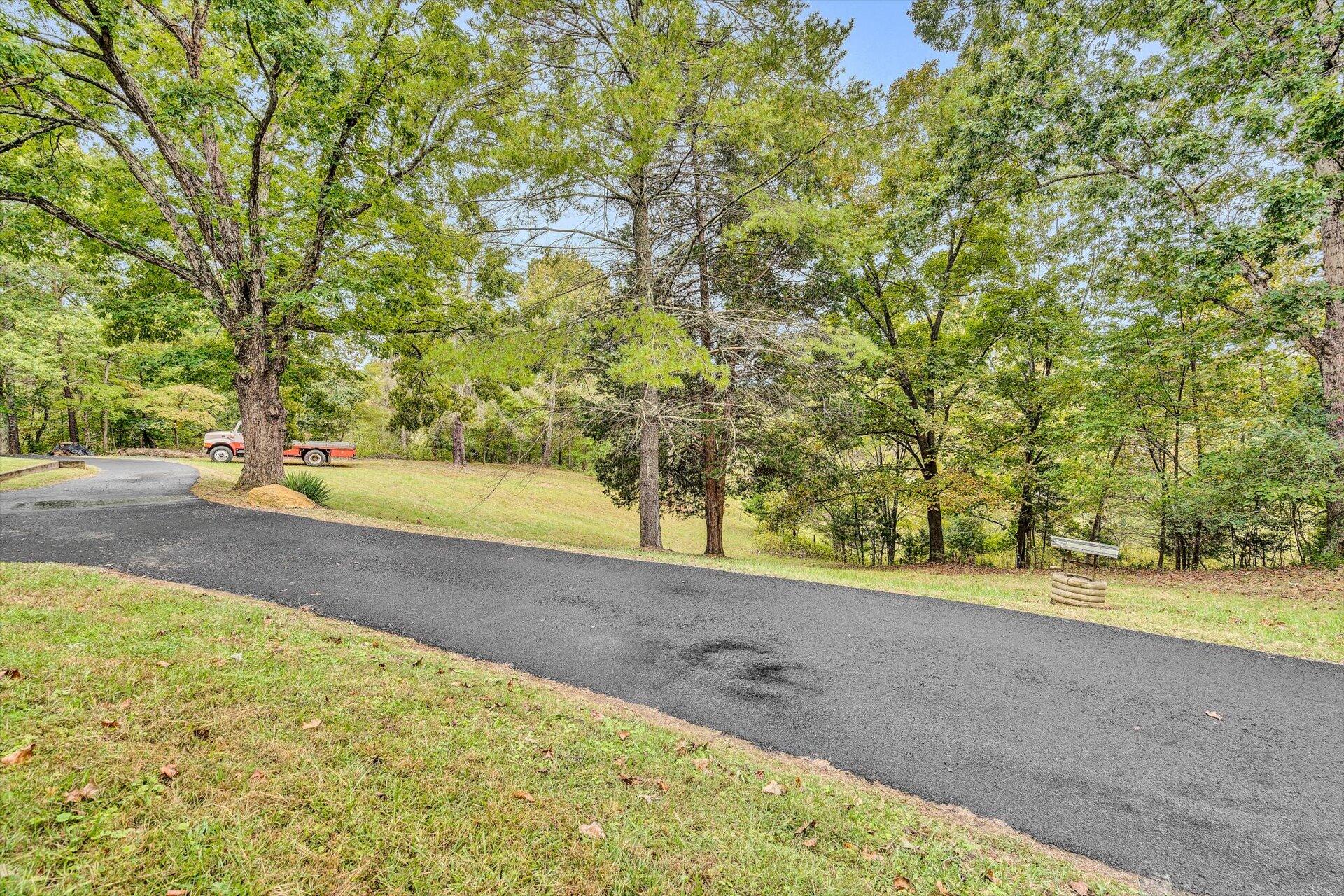 3526 Rutrough Road Southeast Roanoke, VA 24014 - Photo 31 of 33 a view of a road with a yard