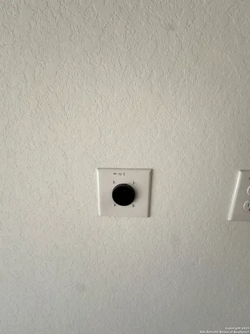 a view of a livingroom with furniture and windows