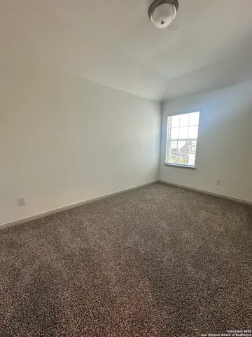 an empty room with a natural light