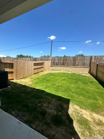 a swimming pool with a yard