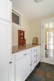 a view of cabinets and window