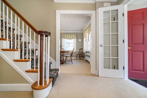 a view of an entryway with staircase