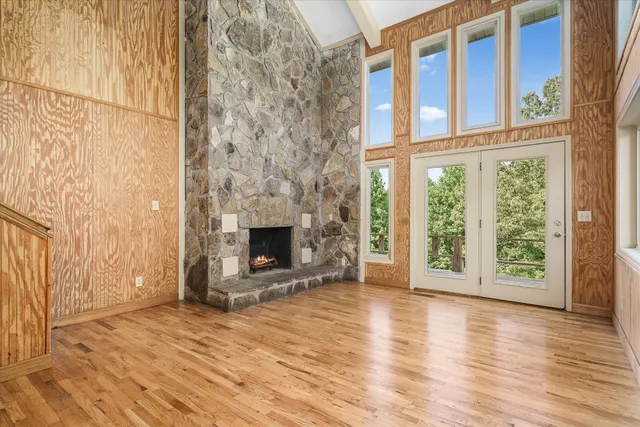 a view of a room with a large window