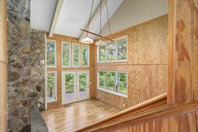 a view of entryway with wooden floor