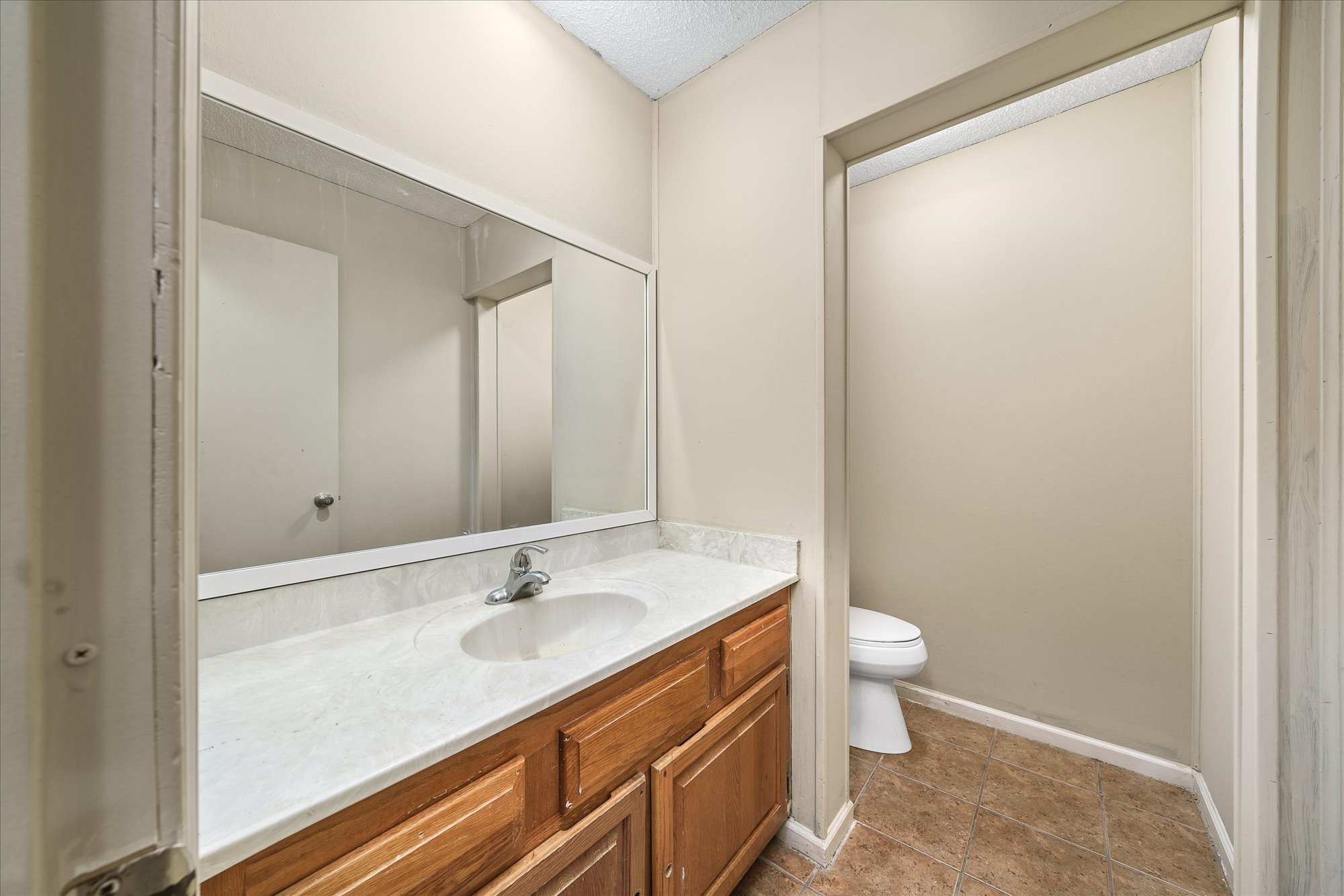 3916 Indian Mound Road Sparta, TN 38583 - Photo 20 of 48 a bathroom with a granite countertop sink toilet and shower