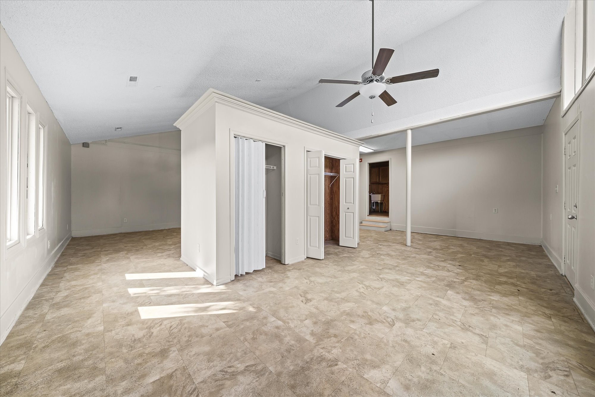3916 Indian Mound Road Sparta, TN 38583 - Photo 23 of 48 a view of a livingroom with a ceiling fan and window