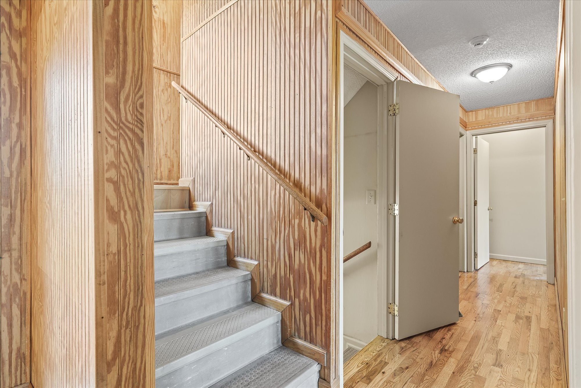 3916 Indian Mound Road Sparta, TN 38583 - Photo 26 of 48 a view of a hallway with wooden floor and staircase