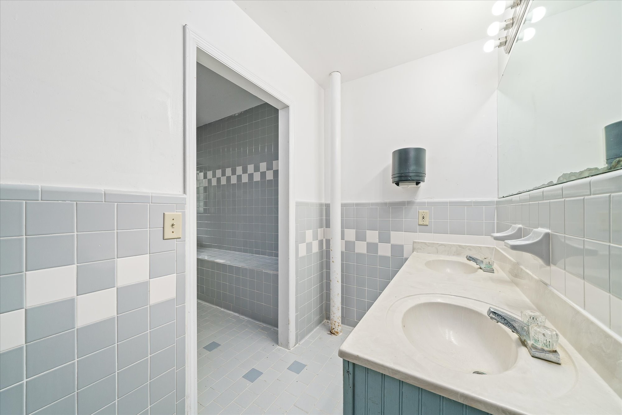 3916 Indian Mound Road Sparta, TN 38583 - Photo 35 of 48 a bathroom with a sink and a mirror