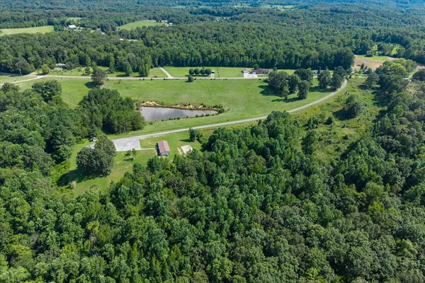 a view of a big yard with a house