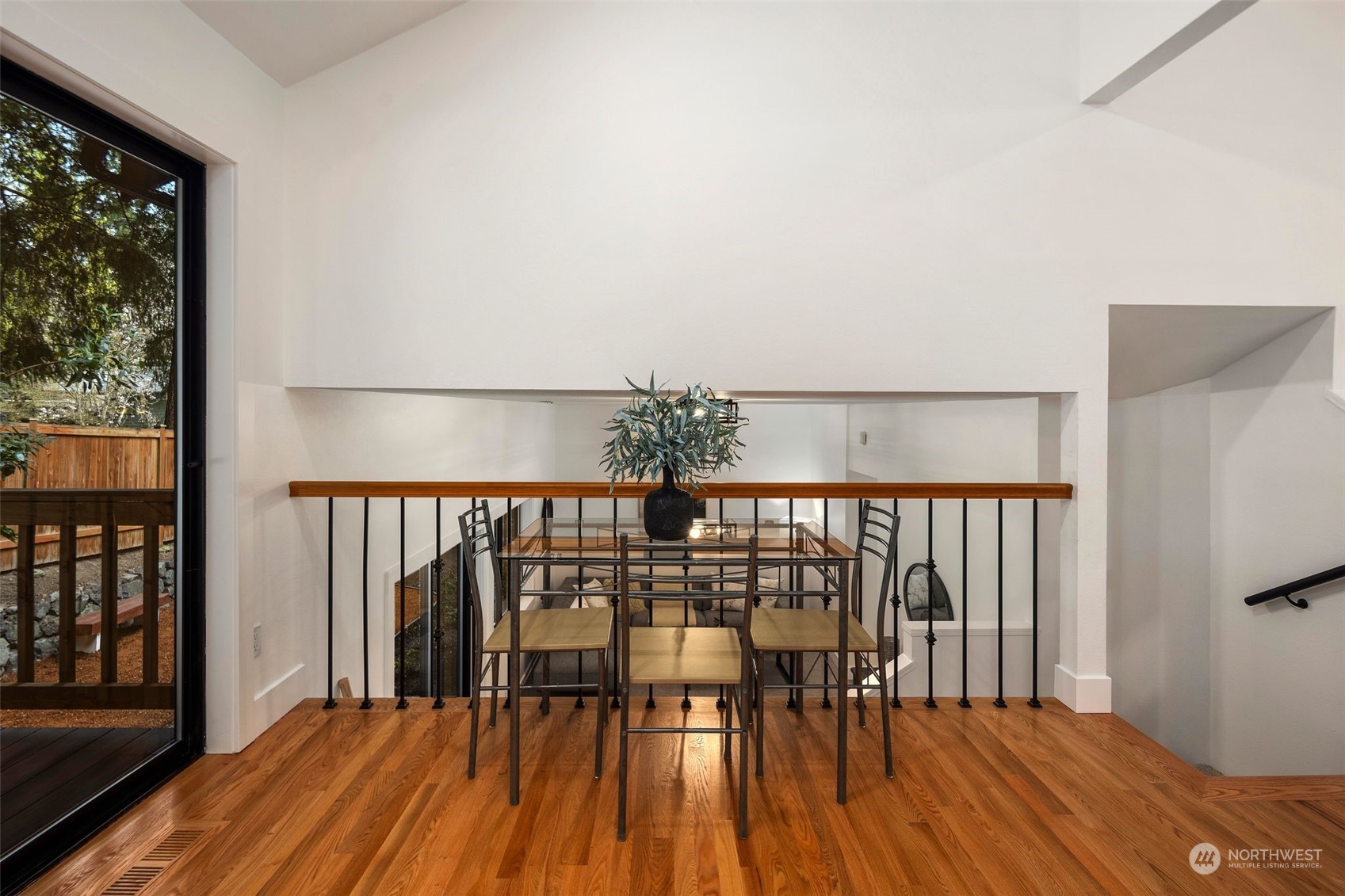 21109 Shell Valley Road Edmonds, WA 98026 - Photo 12 of 40 a view of a chairs and table on the wooden floor