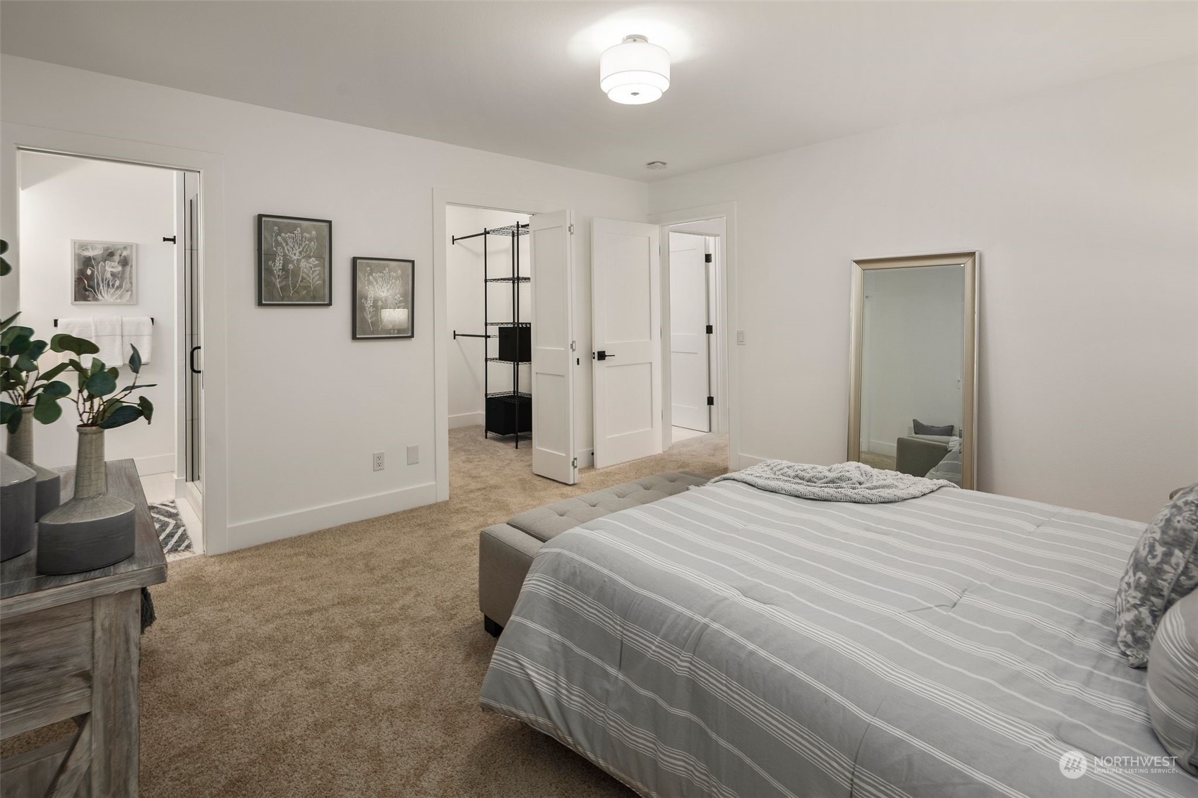 21109 Shell Valley Road Edmonds, WA 98026 - Photo 15 of 40 a bedroom with a bed and a mirror
